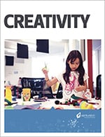A young girl painting at a table in a colorful classroom setting, with the word "creativity" printed at the top of the free entrepreneurship curriculum.