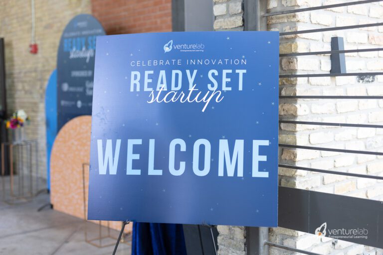 A blue sign with the text 