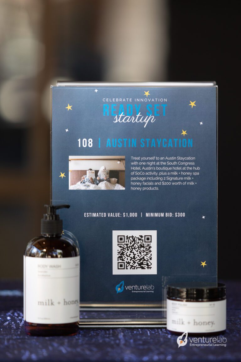 Display showcasing an Austin Staycation package with body wash and cream products from 