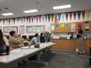 Educator speaking to adult students