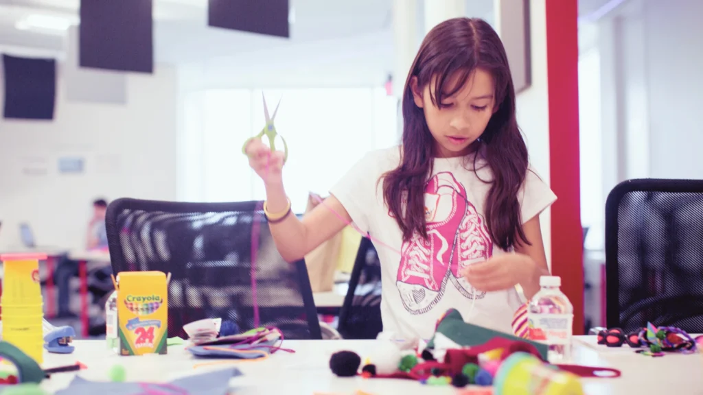 Young Girl Crafting a Prototype for Entrepreneurial Girls