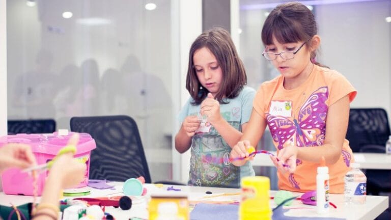 two girls using entrepreneurial skills to create prototypes